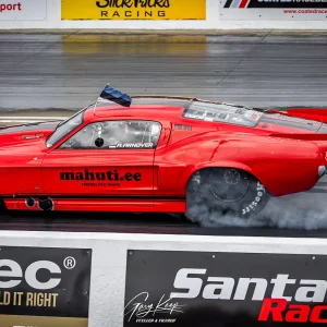 Andres Arnover (Estonia), burning the rubber in true Pro Mod fashion! Red Pro Modified Mustang Drag Car