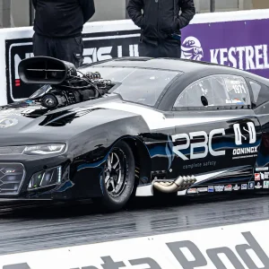 Michael Tooren hitting the load pedal in his Black Pro Mod Camaro ZL1 at Santa Pod Raceway