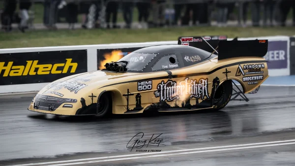 Steve Ashdown & The Undertaker Funny Car blasting up the 1/4 mile at Santa Pod